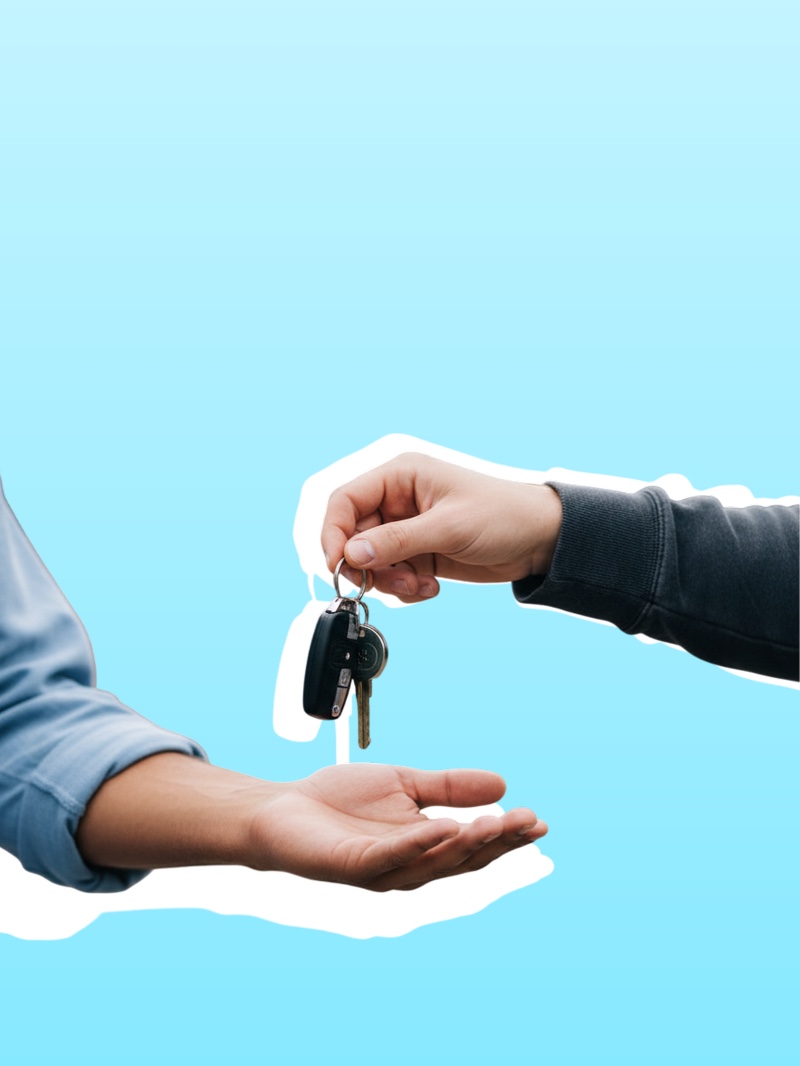 Car key being handed over representing rental and leasing services